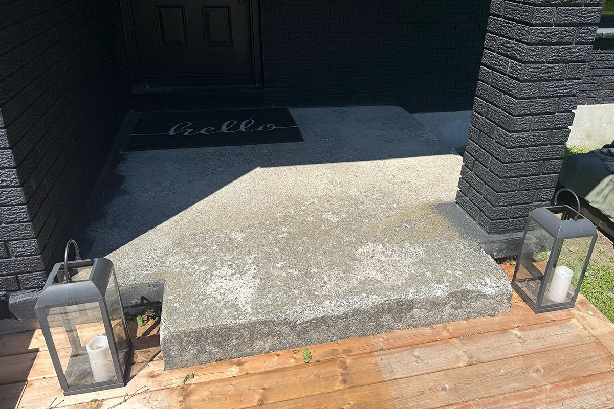 Concrete front porch before quartz coating in Ottawa