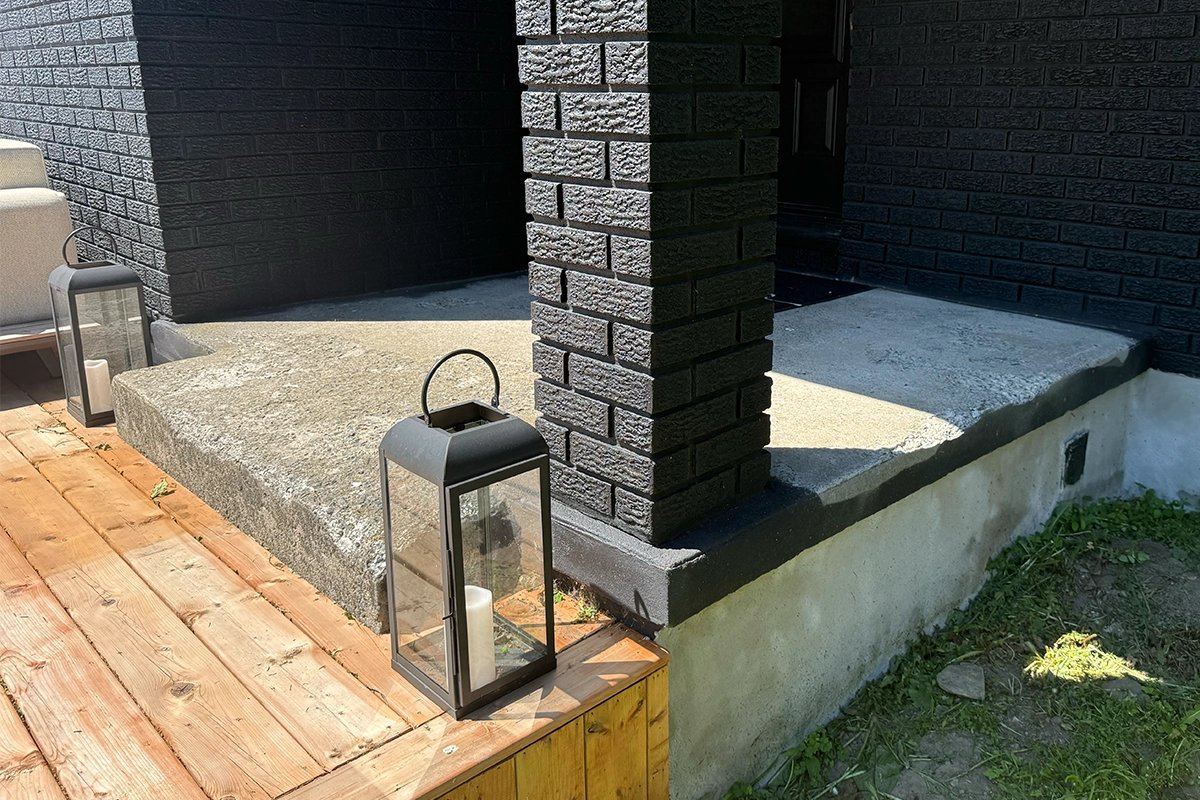 Worn concrete porch before coating in Ottawa