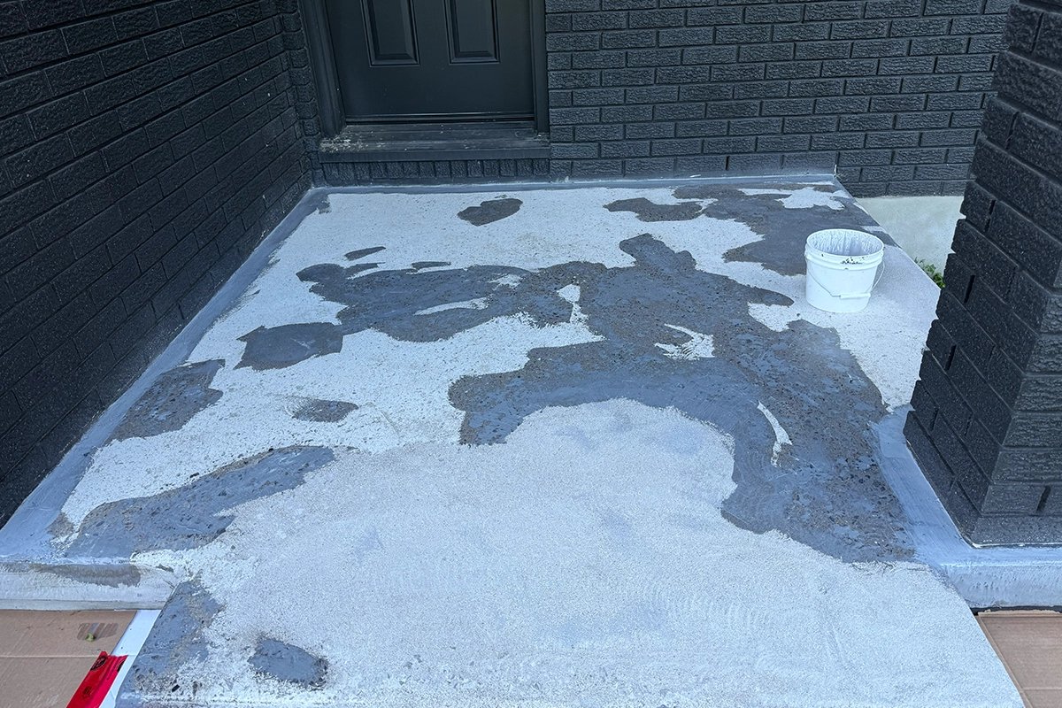 Concrete crack repair before quartz coating on Ottawa porch
